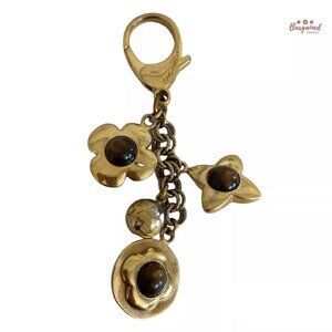 Authentic LOUIS VUITTON Gold Brown Bijoux Sac Tresor Flower Bag Charm